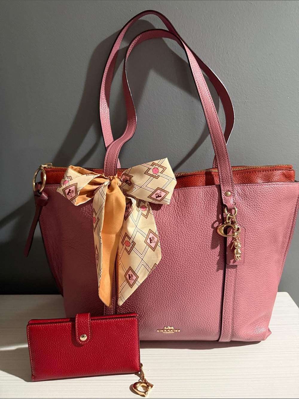 Coach 1573 May Tote Bag in a pink pebbled leather finish.w/wallet & coach charms